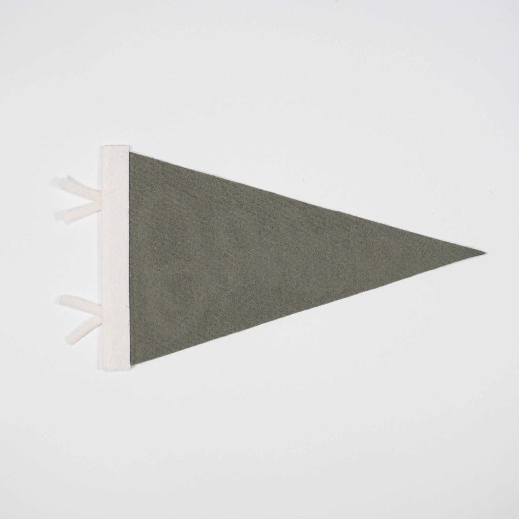 Gray triangle-shaped object on a white background