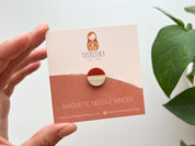 Circle magnetic needle minder, needle magnet